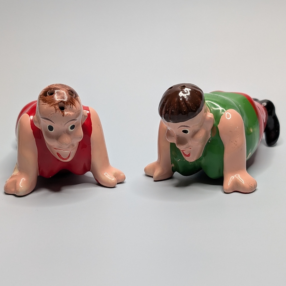 Vintage Push Ups Men colorful salt and pepper shakers.
